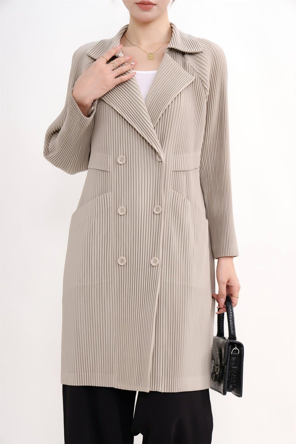 Women’s mid-length striped suit coat in light khaki, double-breasted button front, notched lapel pockets.
