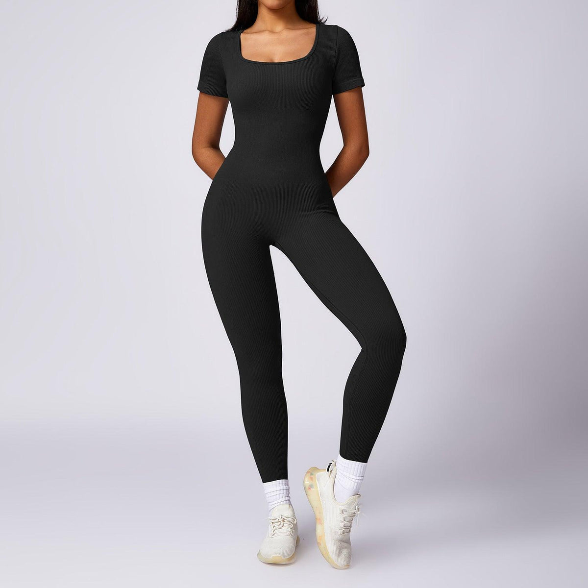 Women's seamless back one-piece bodysuit in black, short-sleeve, square neckline, full length