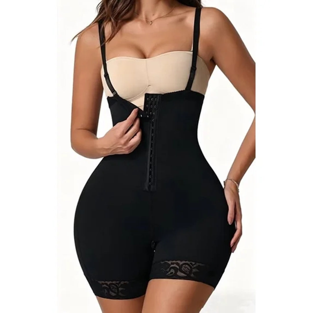 Black tummy control bodysuit with beige bust panel, lace hem shorts, front zipper
