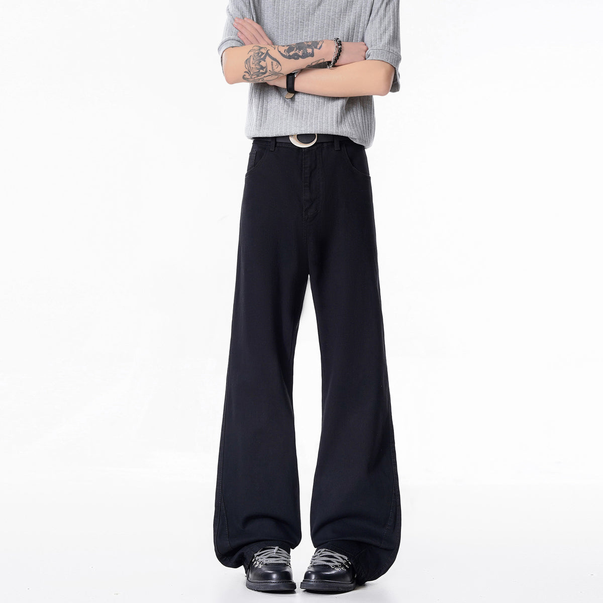 Black straight-leg jeans with relaxed fit and front button closure