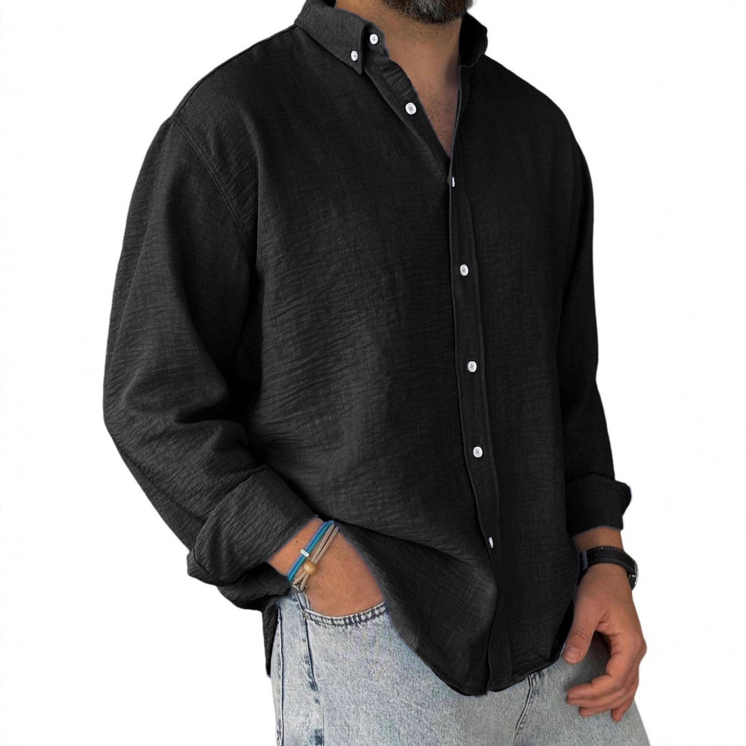Men's washed-cotton button-down shirt in black, long sleeves with button cuffs.