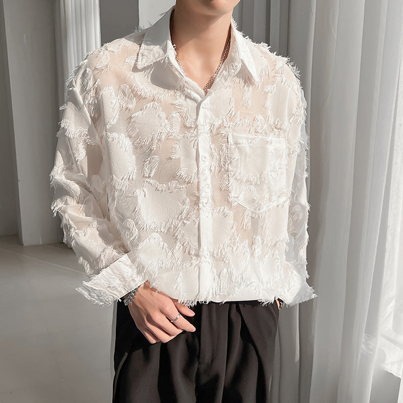 White long-sleeve button-up shirt with textured pattern and frayed edges