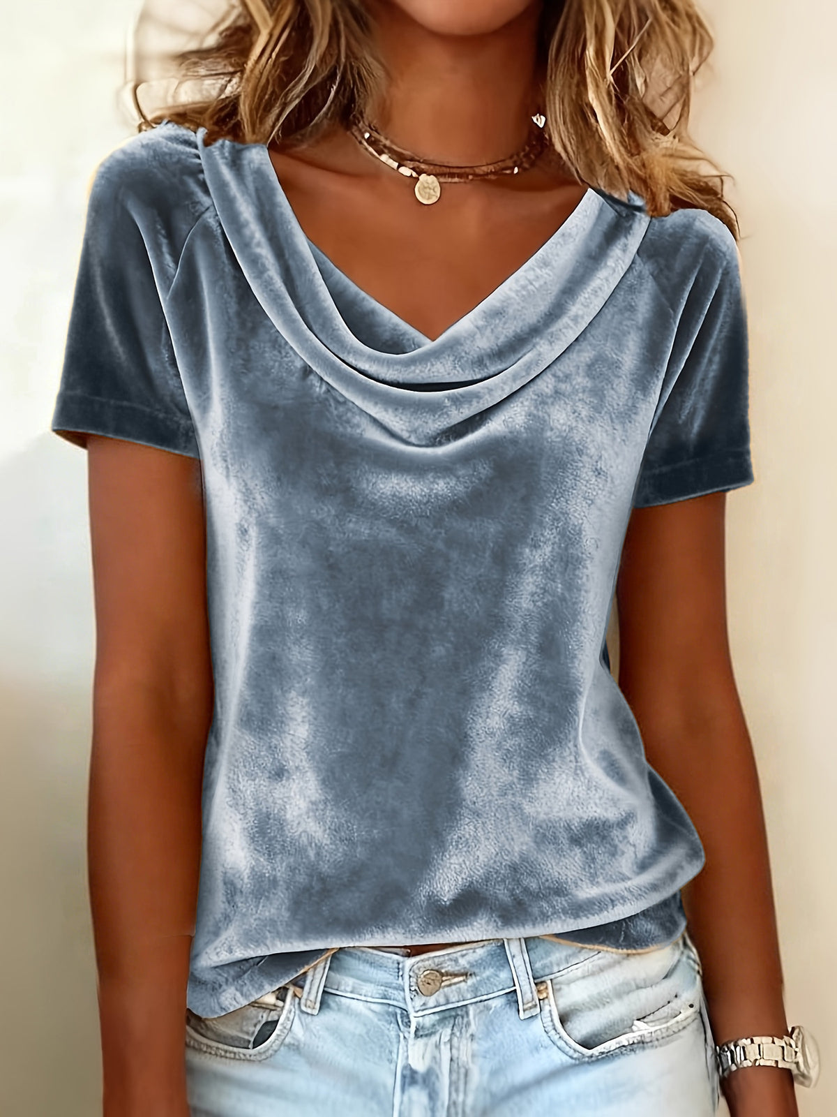 Light blue velvet scoop-neck t-shirt with short sleeves and draped cowl neck