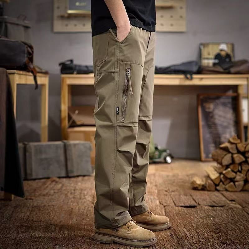 Army green paratrooper cargo trousers with side zip pocket and cargo flap details