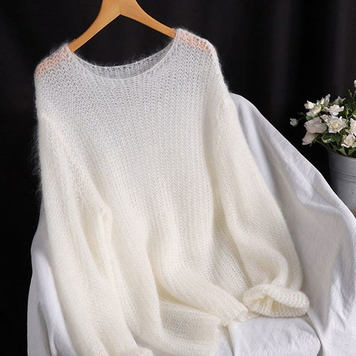 Off-white hollow-knit pullover sweater top, crew neck, long sleeves, loose fit.
