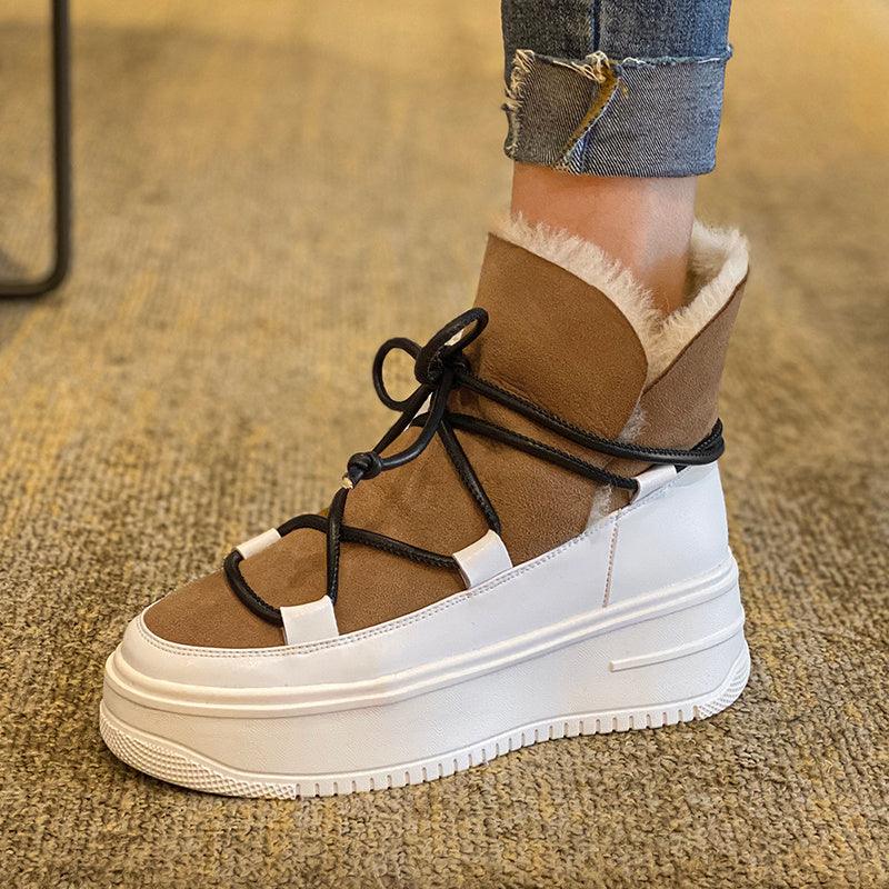 Tan plush fleece warm boots with lace-up front, teddy lining, and white platform sole.