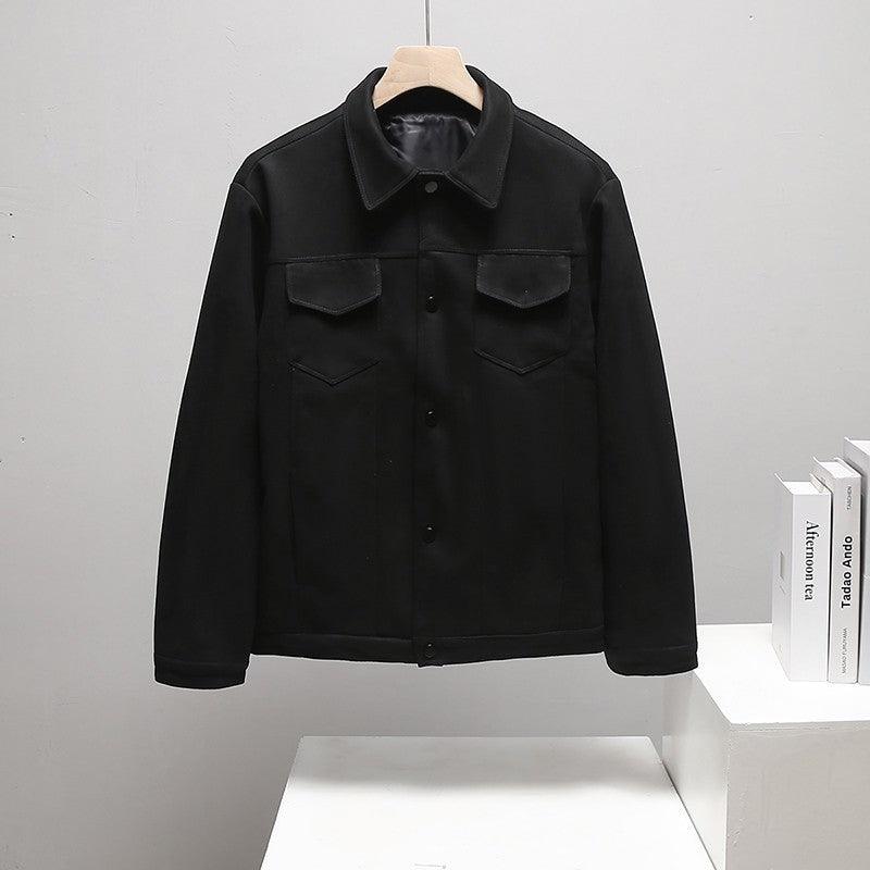 Black button-front jacket with pointed collar and two chest flap pockets