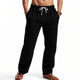 Black linen beach shorts with drawstring waist and straight legs