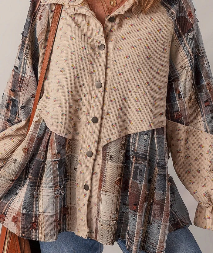 Cream floral button-front top with stand collar, textured plaid side panels, long sleeves
