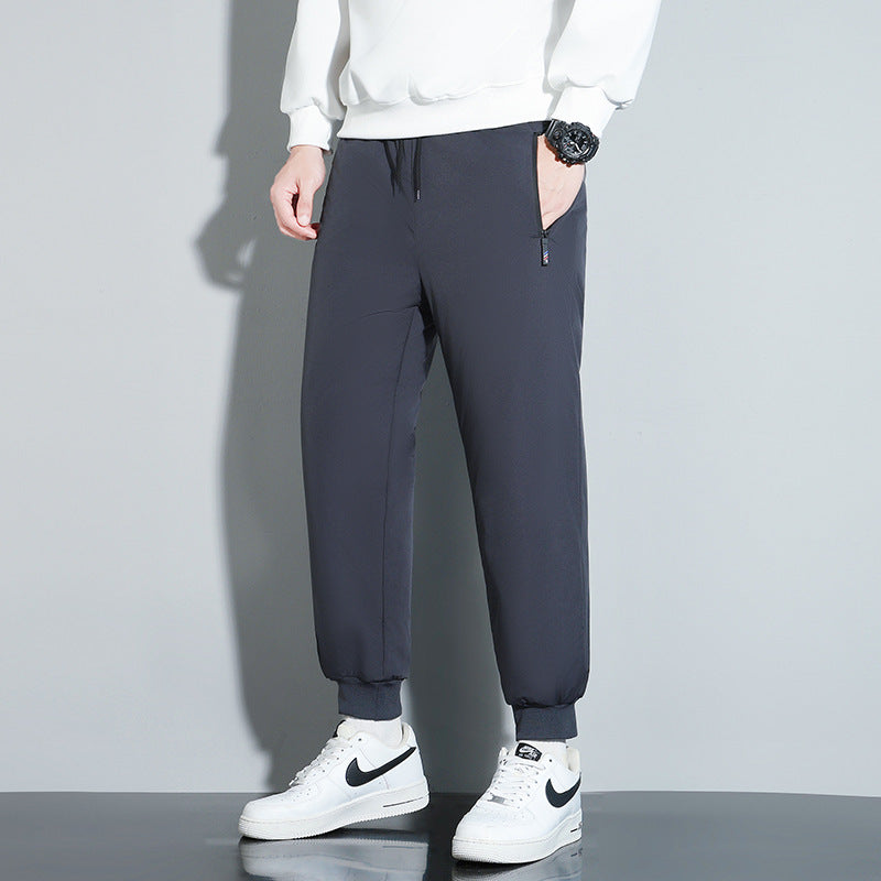 Men’s dark casual trousers with drawstring waist and ankle cuff fleece lining