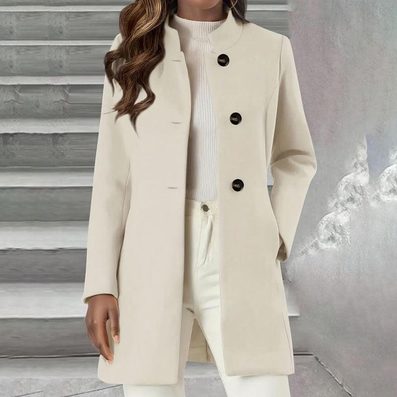 Beige tailored long wool coat with black button placket and side slit, front view