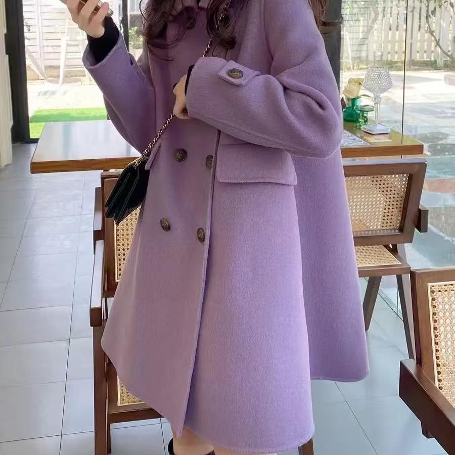 Lavender wool coat, double-breasted with dark buttons and flap pockets, long sleeves