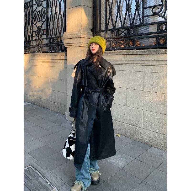 Black long leather coat with belted waist and double-button front