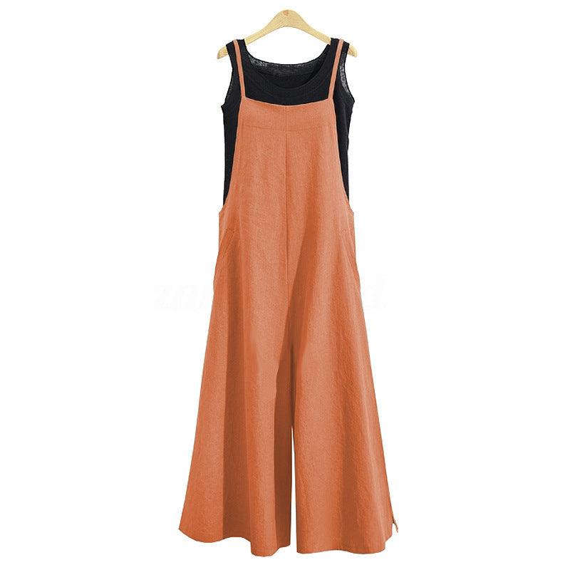 Orange wide-leg one-piece jumpsuit with black scoop neckline and wide straps