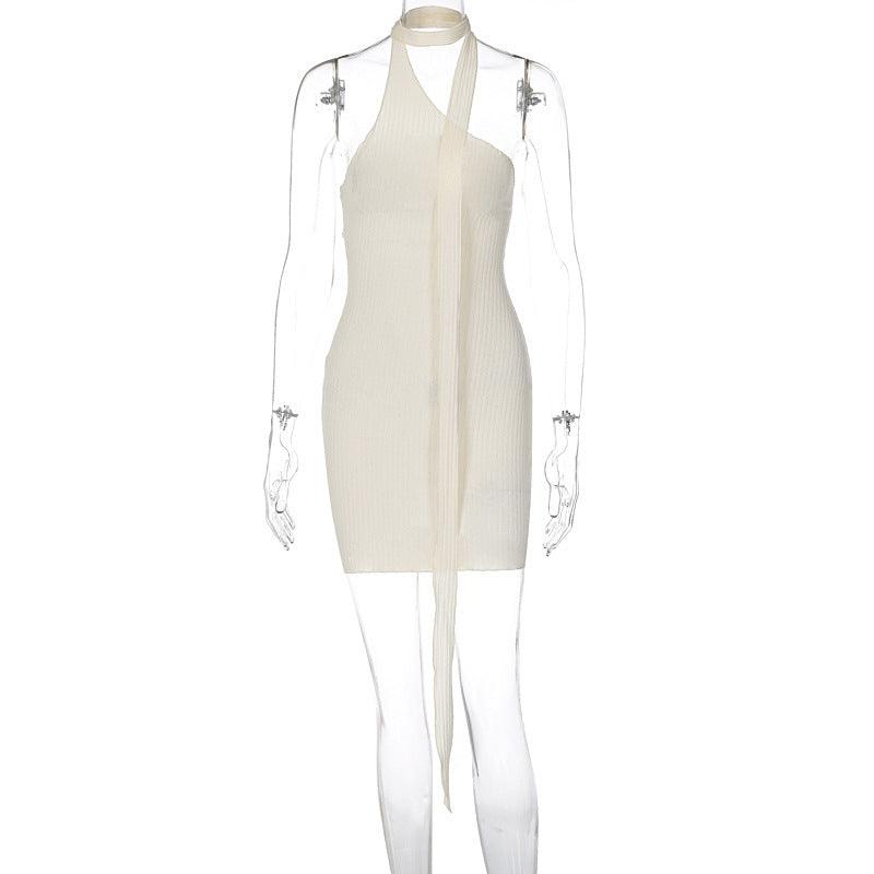 Cream halter mini dress with long hanging tie strings and fitted sleeveless shape