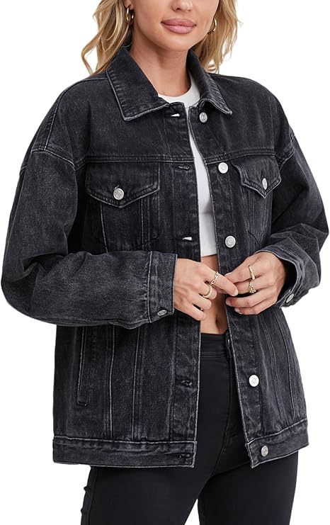 Women's dark denim jacket with flap pockets and silver button accents