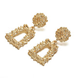 Metal embossed floral earrings - WOMONA.COM