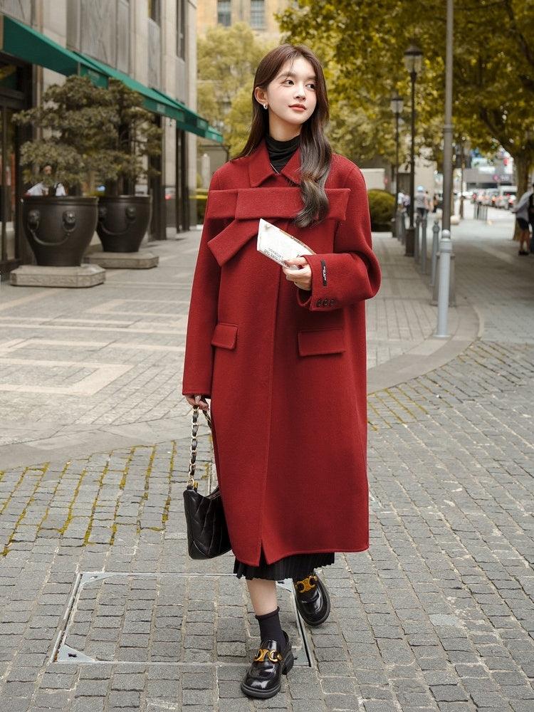 Women's red wool long coat with bowknot collar, button front, and flap pockets