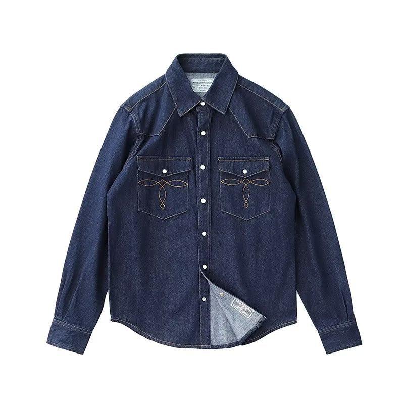Dark blue boys denim button-up shirt front view, embroidered chest pockets, white buttons