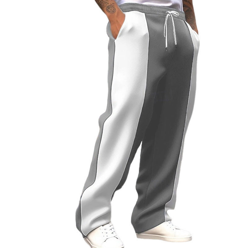 Men's gray and light side-panel track trousers with elastic drawstring waist.