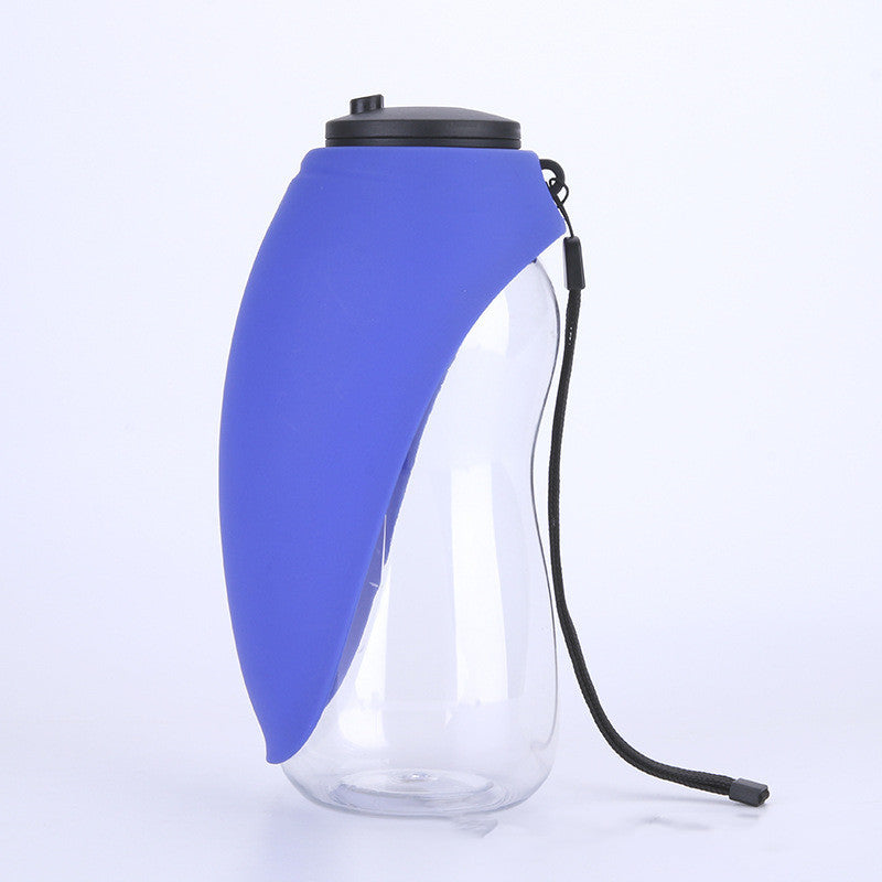 Blue portable pet water bottle with clear body, black cap, and black wrist strap