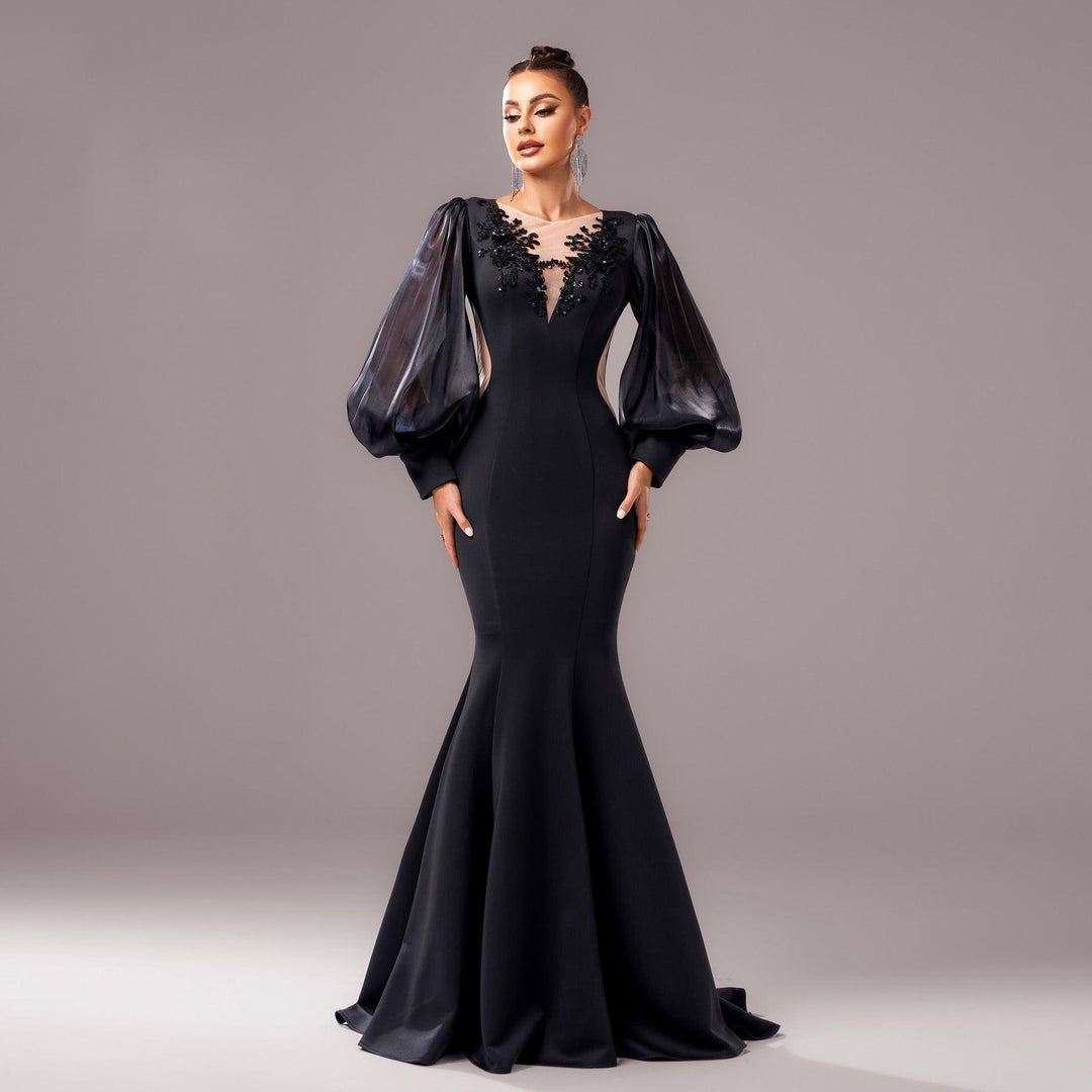 Black applique sheath fishtail dress with puff sleeves and square neckline detail