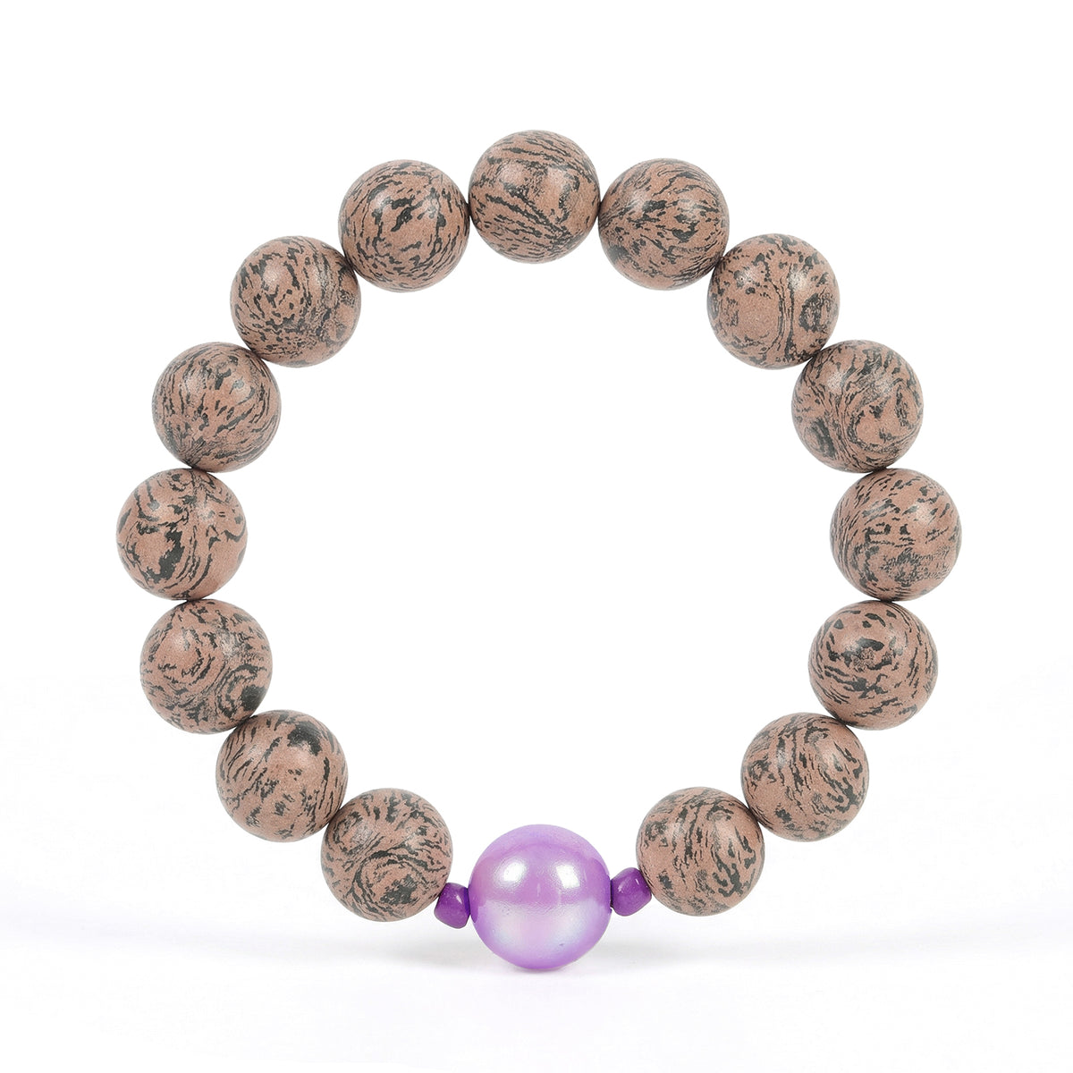 Beaded herbal bracelet with speckled tan beads and a glossy purple center bead