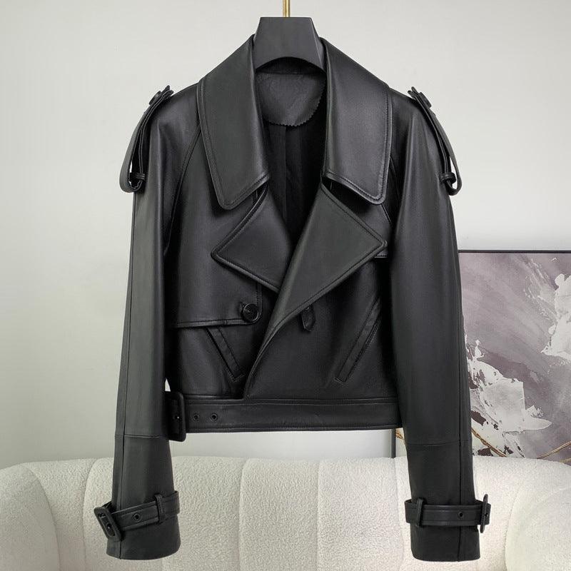 Black leather cropped jacket front view with notch lapel, flap pocket, and snap cuffs