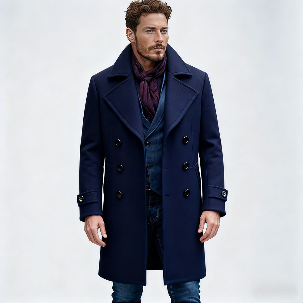 Navy blue cotton-padded wool coat with wide lapels, double-breasted buttons, and side belt tabs