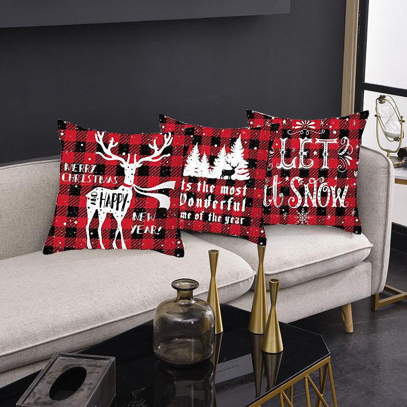 Christmas cushion cover, red and black plaid with reindeer and holiday lettering