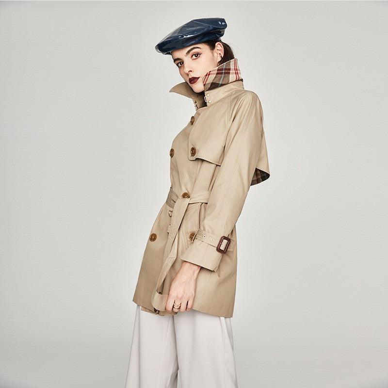 Women's mid-length trench coat in khaki-beige with double-breasted buttons and belt.
