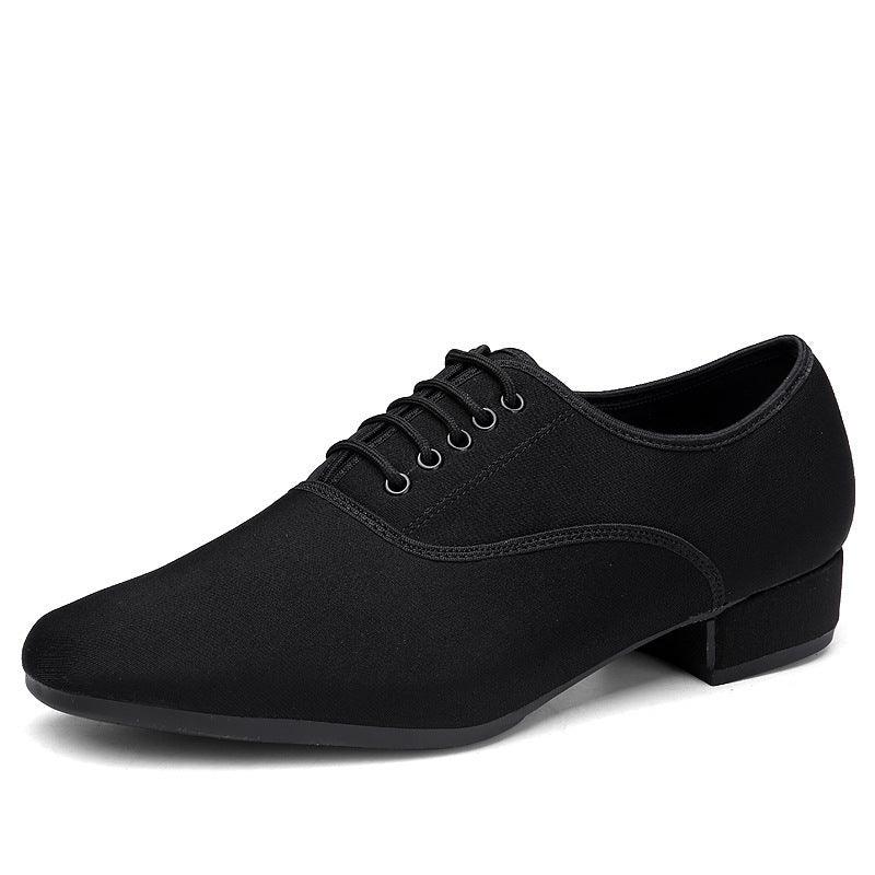 Black oxford cloth shoes with lace-up front and low block heel