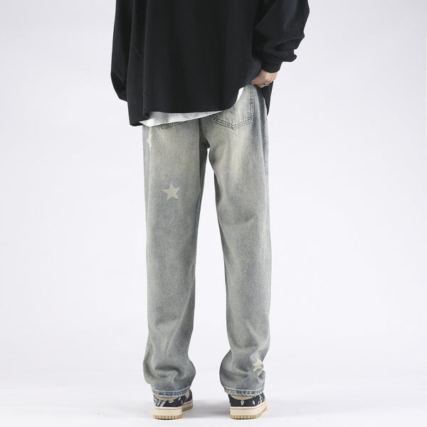 XINGX Printed Yellow Mud Dyed Ripped Jeans For Men - WOMONA.COM