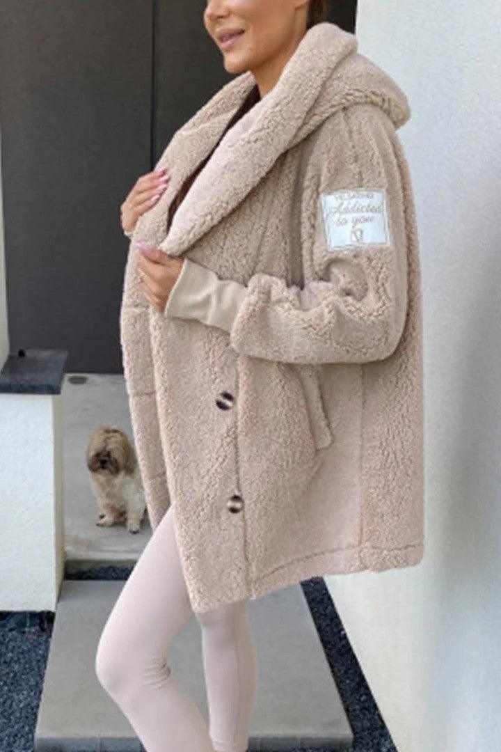 Women’s plush hooded coat in light beige with hood and textured sherpa-like fabric