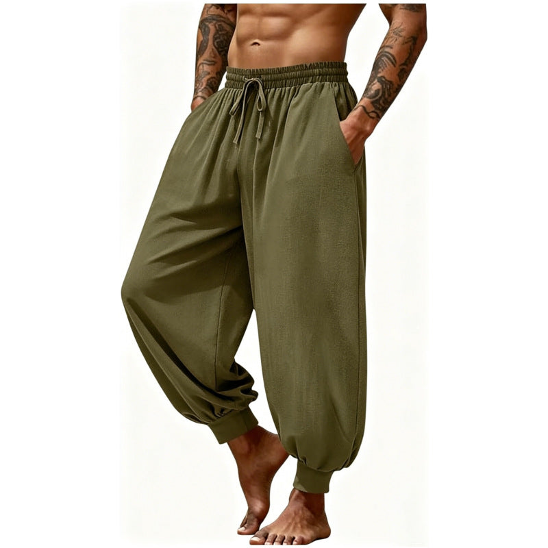 Men's breathable casual pants in olive green, elastic waistband drawstring, cuffed jogger style.
