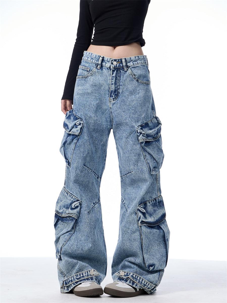 Women's blue multi-pocket workwear jeans with front flap cargo pockets and wide legs