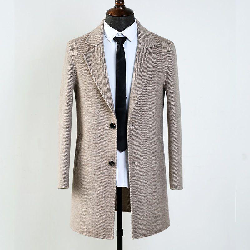 Beige wool overcoat with notched lapels, two-button front, and side welt pockets