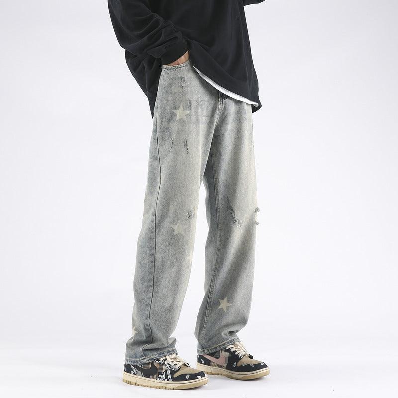 XINGX Printed Yellow Mud Dyed Ripped Jeans For Men - WOMONA.COM