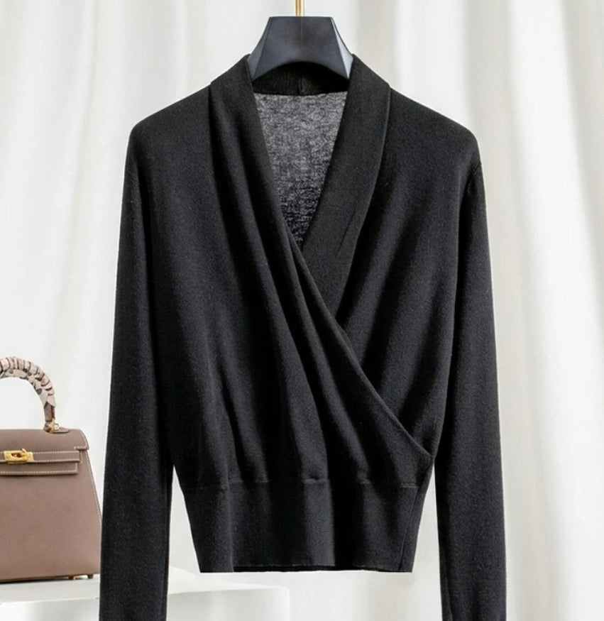Black knitted long-sleeve top with V-neck wrap overlap