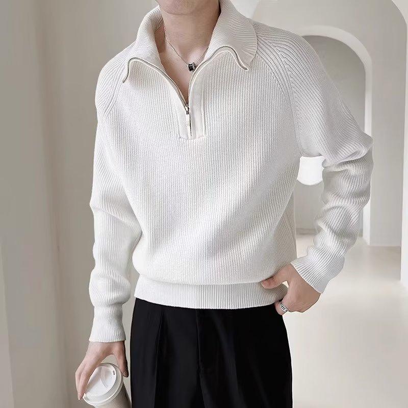 White knit pullover coat with long sleeves, quarter-zip collar and ribbed hem