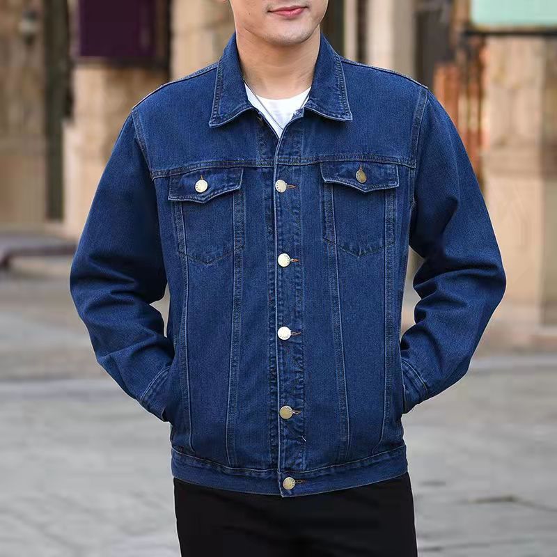 Men’s blue denim jacket with stand collar, button front, and two chest flap pockets
