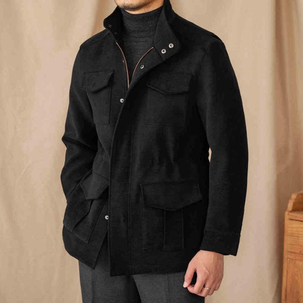 Black multi-pocket safari coat with snap stand collar and chest flap pockets
