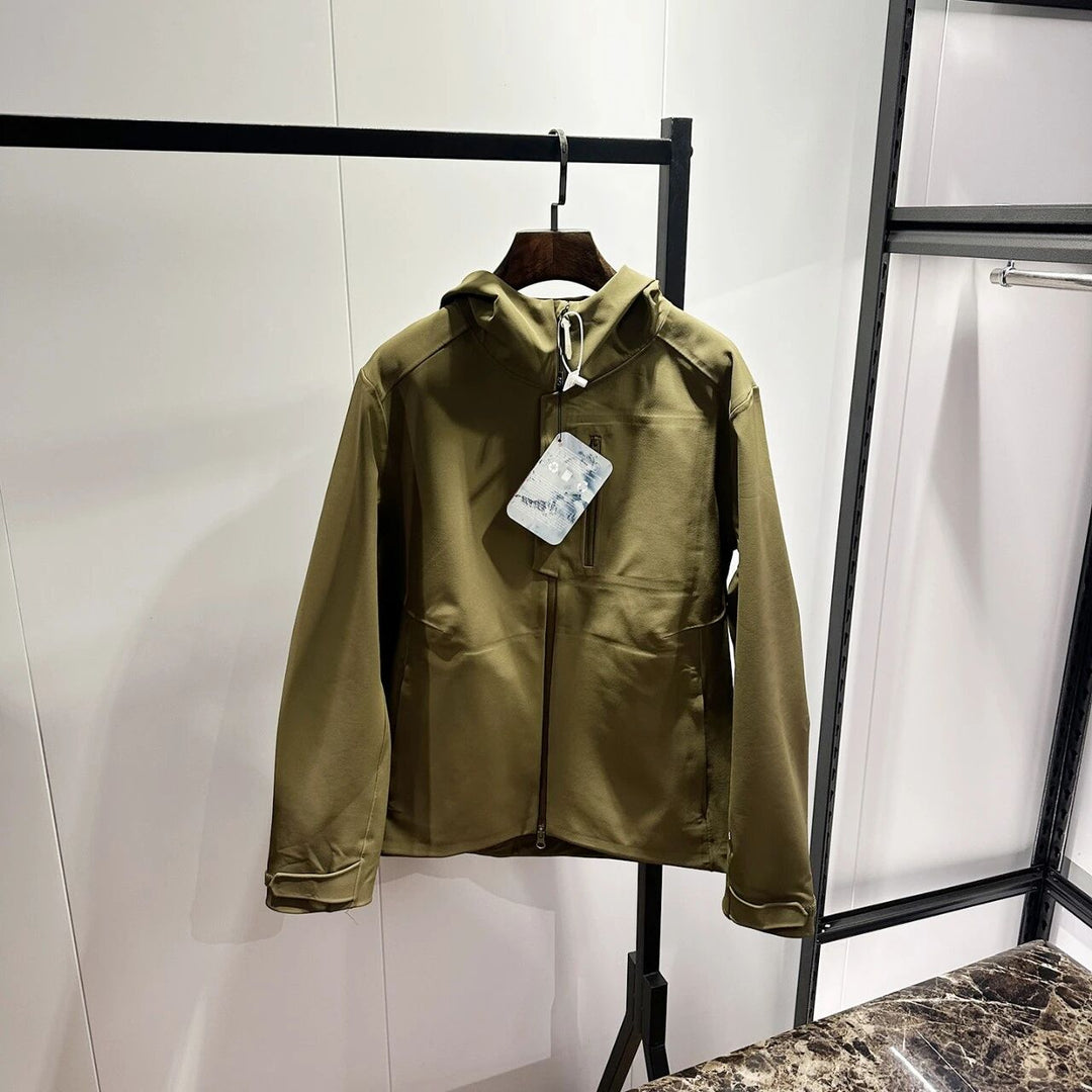 Military green hooded zip-up softshell jacket with taped seams and front zipper.
