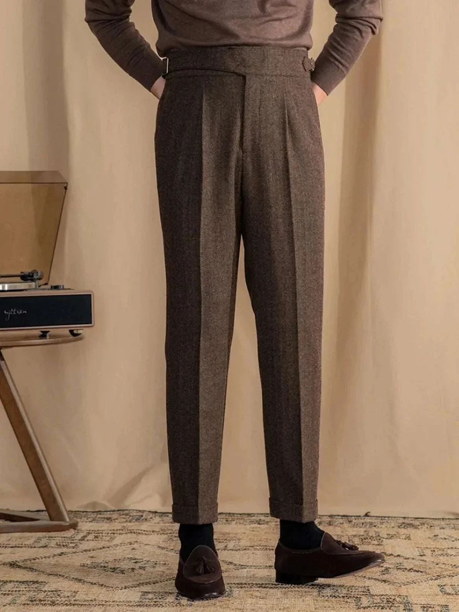 Vintage wool herringbone trousers with pleated front and tapered leg, dark brown
