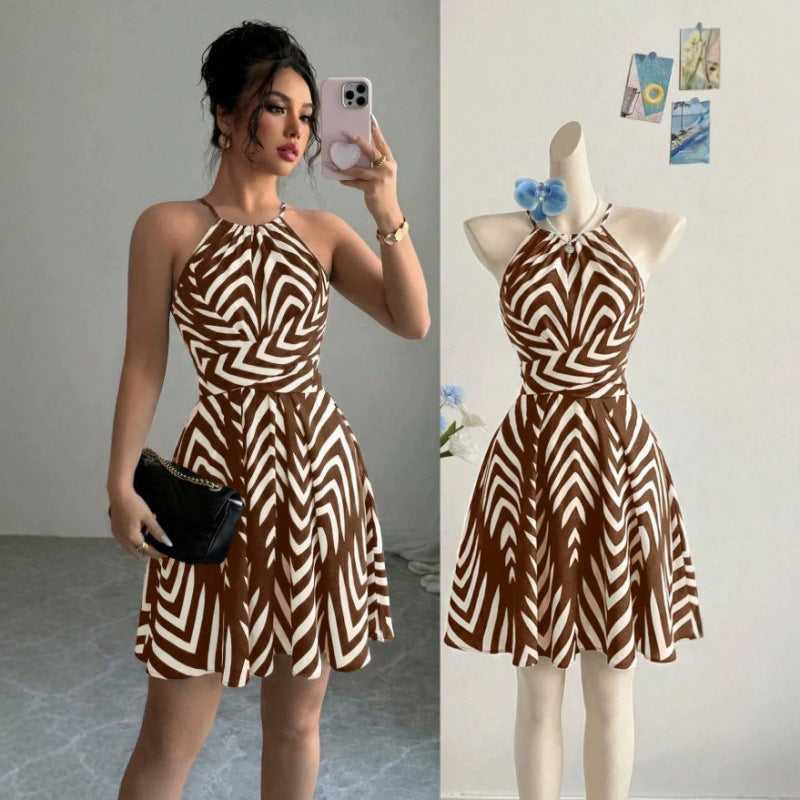 Brown halter-neck dress with white zigzag stripe print and flared skirt