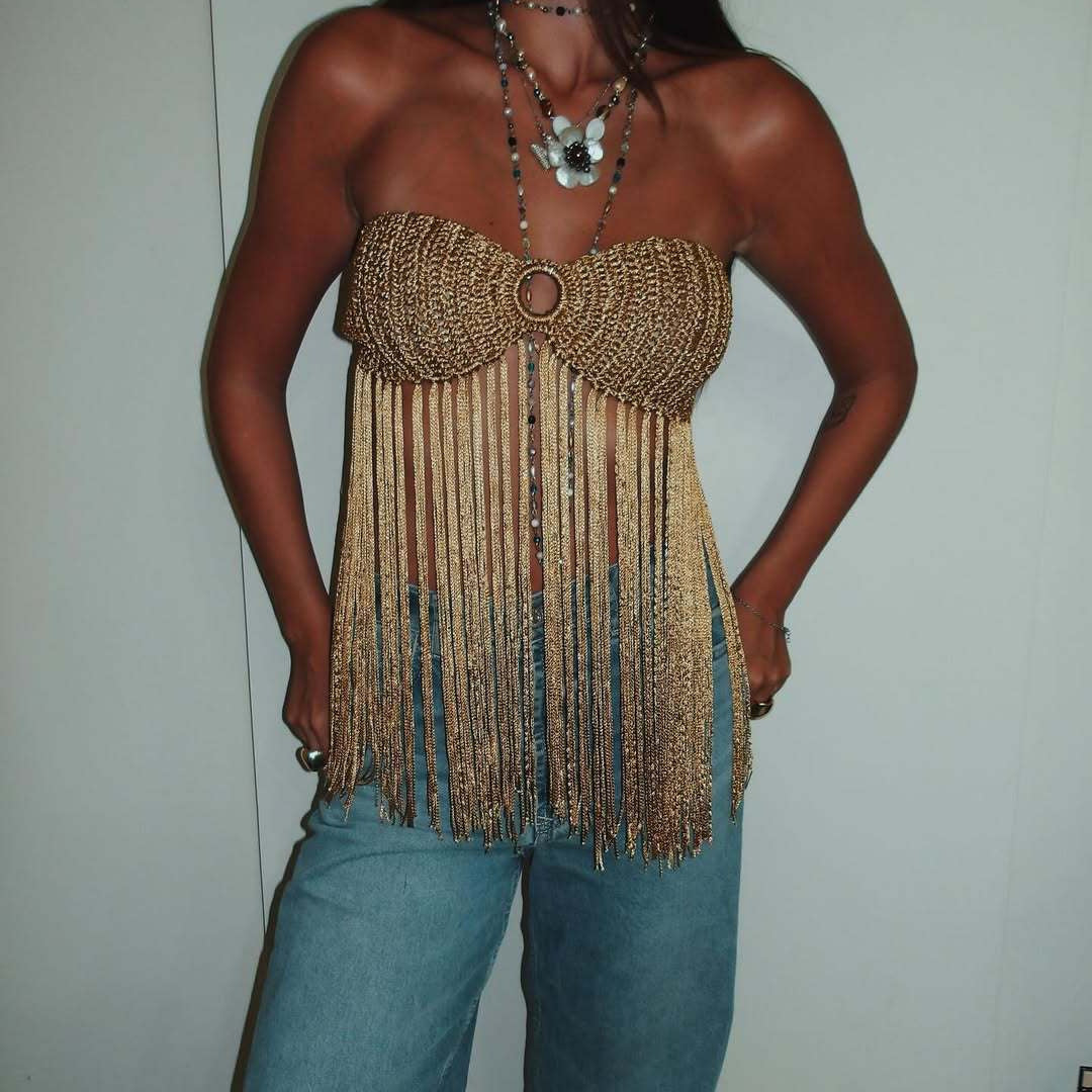 Women’s halter-neck tube top with gold knit bust and hanging tassel fringe