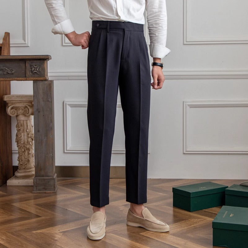 Black straight-leg casual pants with belt loops and crease at the front
