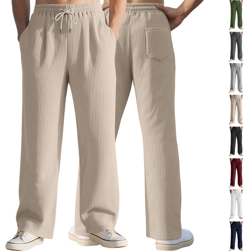 Light khaki wide-leg sports sweatpants with elastic waistband and drawstring cuffs.