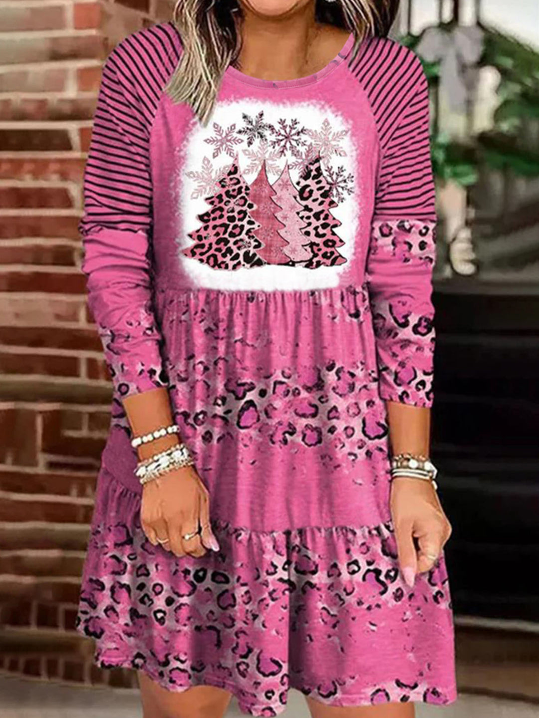 Plus Size Christmas Tree Tiered Knit Dress — pink Christmas tree dress worn on model