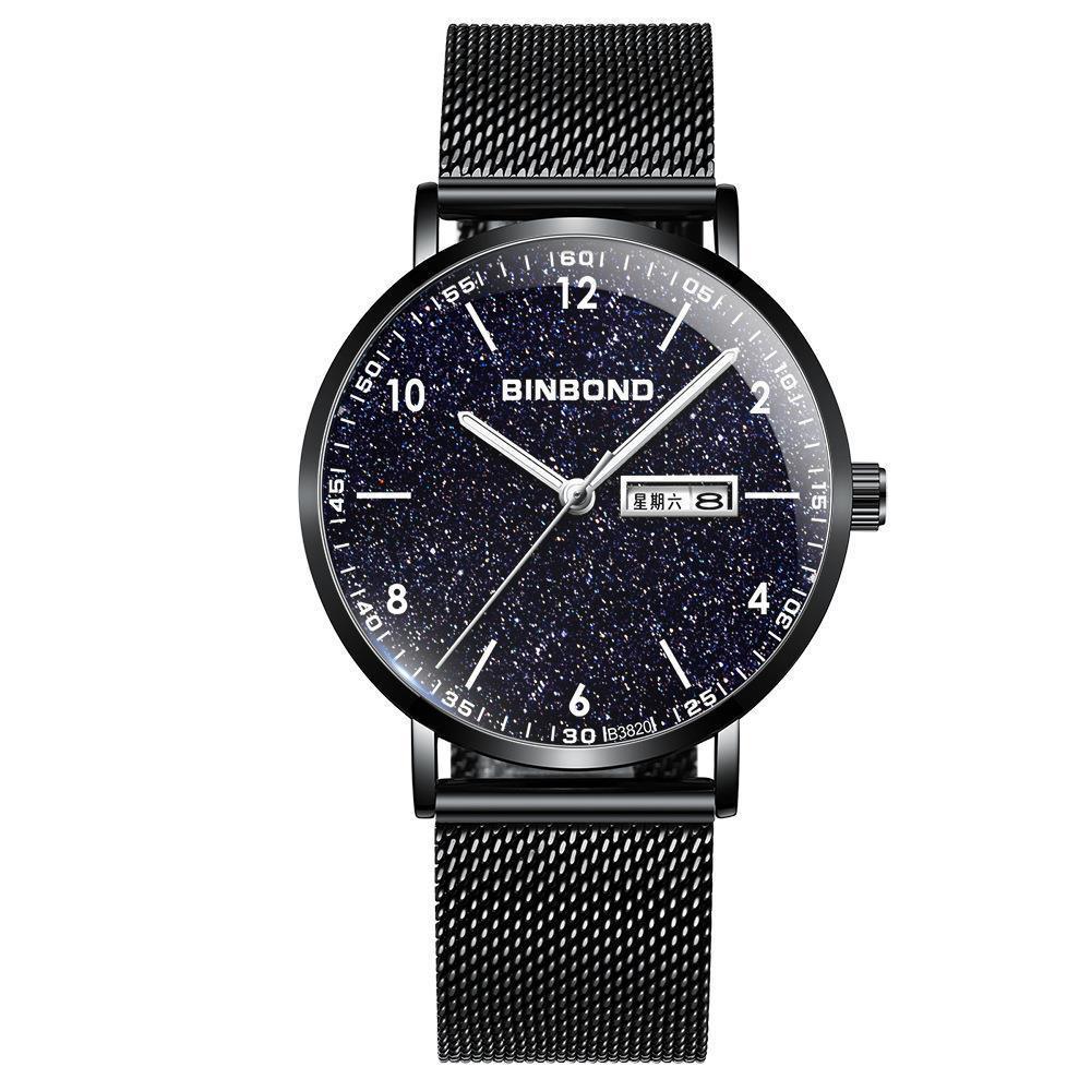 Analog wristwatch with dark blue speckled dial and three hands, black mesh strap.